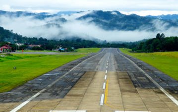 Planning of New Airport Runway in Constrained Environment